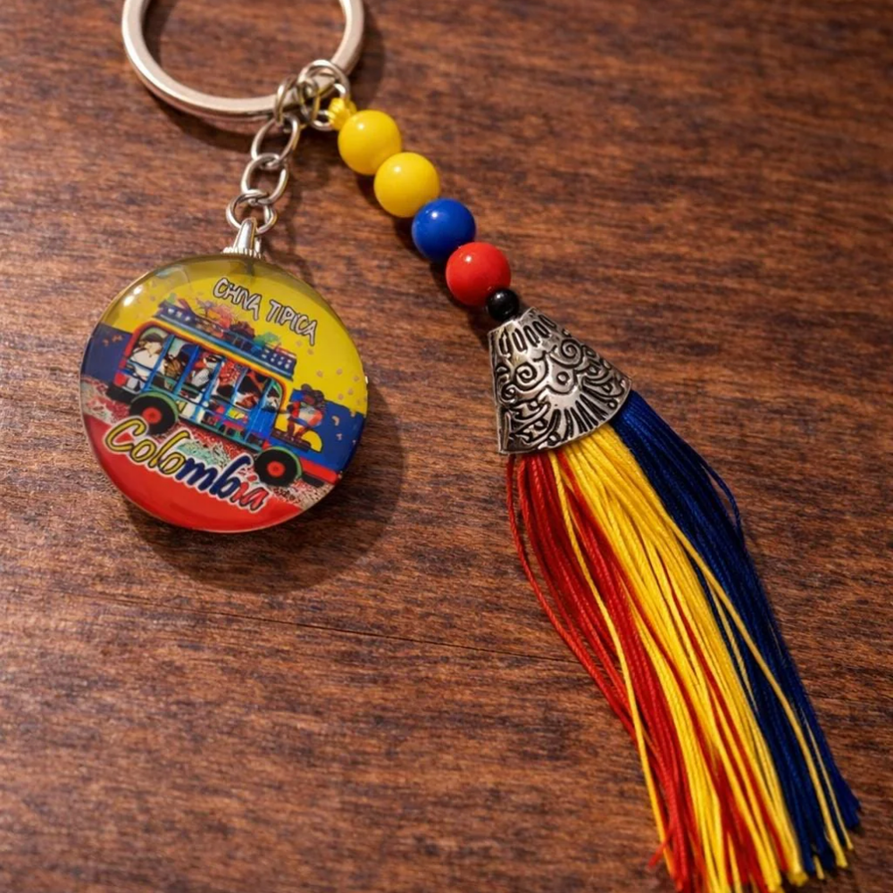 Colombian Flag Tassel Keychain – Handmade Souvenir with Beads & Metal Charm – Chiva or Vallenato Design