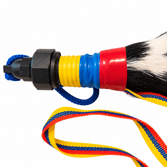 Detailed close-up of handcrafted cowhide bottle closure and woven cord