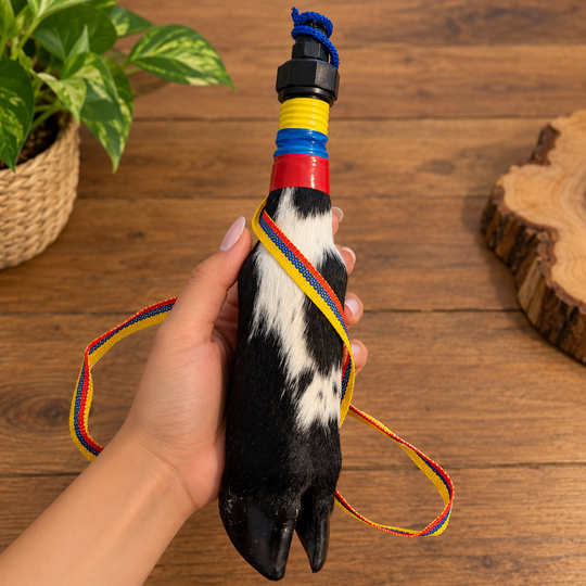 Close-up of removable cap on handcrafted cowhide hoof bottle