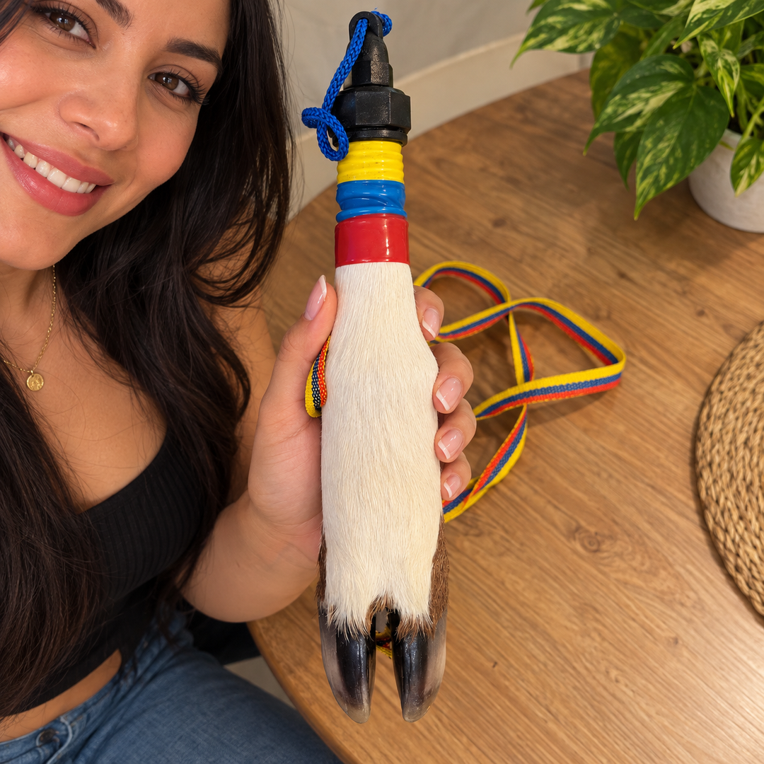 Smiling woman holding handcrafted cowhide hoof bottle