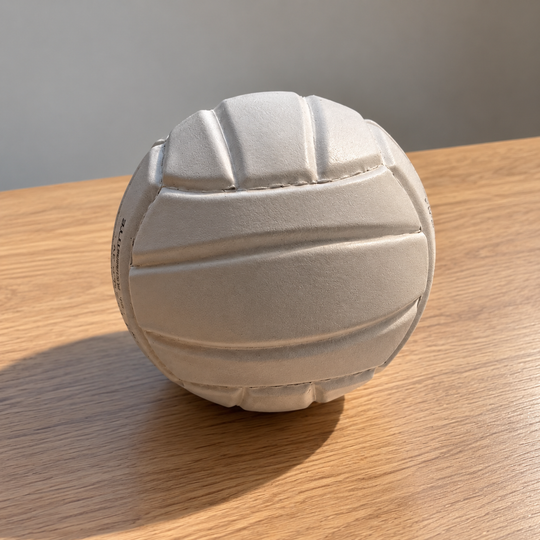 1958 collectible soccer ball handmade in Mongui, Boyaca, Colombia displayed on a wooden table