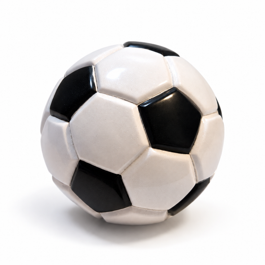 Black and white 1974 collectible soccer ball handmade in Mongui, Boyaca, Colombia on a white background