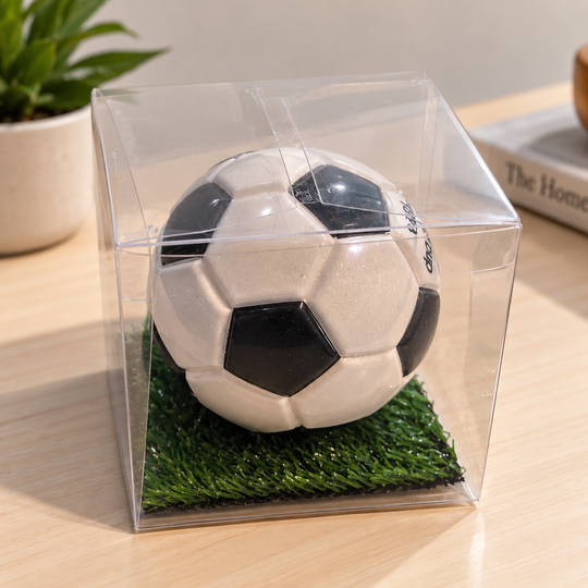 1974 collectible soccer ball handmade in Mongui, Boyaca, Colombia displayed in a clear box