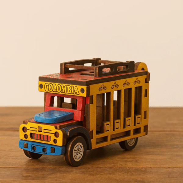 Front view of miniature Colombian Chiva Rumbera handmade wooden bus, colorful folk art souvenir